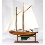 An early 20th Century twin mastered pond yacht wit