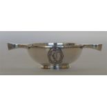 A small two handled quaich on pedestal base with o