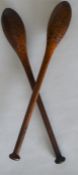 A pair of unusual novelty wooden juggling pins. Es