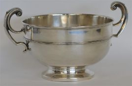 A large two handled pedestal bowl. Birmingham 1908