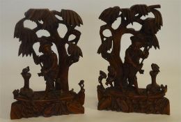 A good pair of hardwood Chinese figures with bird