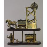 An unusual brass centrepiece in the form of a coal