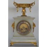 An onyx and brass mounted clock with gilt decorati