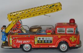 A mechanical toy in the form of a fire engine. Est