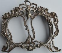 A good quality double picture frame decorated with
