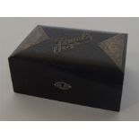 An attractive ebony and silver mounted box with en