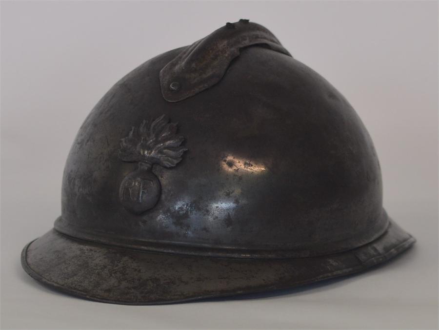 A French artillery helmet mounted with a grenade. - Image 3 of 4