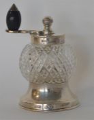 A good cut glass pepper grinder with turned handle
