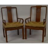 A pair of Oriental carver chairs with hardwood sea