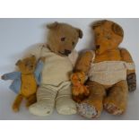 A group of old teddy bears. Est. £30 - £50.