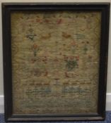 A good framed sampler decorated with animals. Date