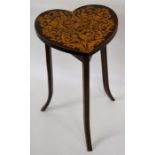 An attractive inlaid heart shaped occasional table