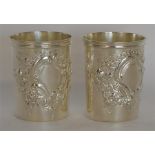 A good pair of embossed beakers with reeded rim, t