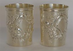 A good pair of embossed beakers with reeded rim, t