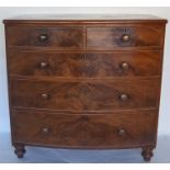 A good mahogany bow front chest of drawers on bun