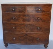 A good mahogany bow front chest of drawers on bun