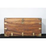 A good camphor wood trunk with brass handles. Est.