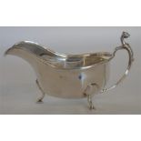 A good sauce boat with reeded rim and panelled sid