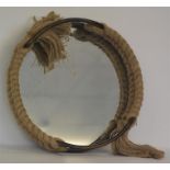 An attractive circular mirror with rope frame. Est