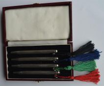 A good set of four engine turned bridge pens with