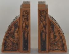 A pair of good aesthetic book ends decorated with
