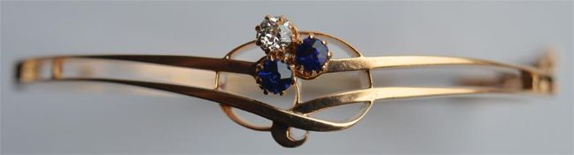 An Antique Art Nouveau sapphire and diamond hinged