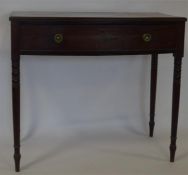 A Georgian mahogany single drawer side table on tu