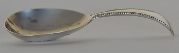A Victorian caddy spoon with ball decoration. Lond