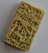 A good quality Antique carved ivory card case with