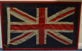A large framed Union Jack flag. Est. £40 - £60.
