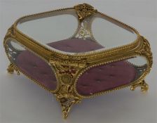 A good quality gilded jewel case, the frame heavil