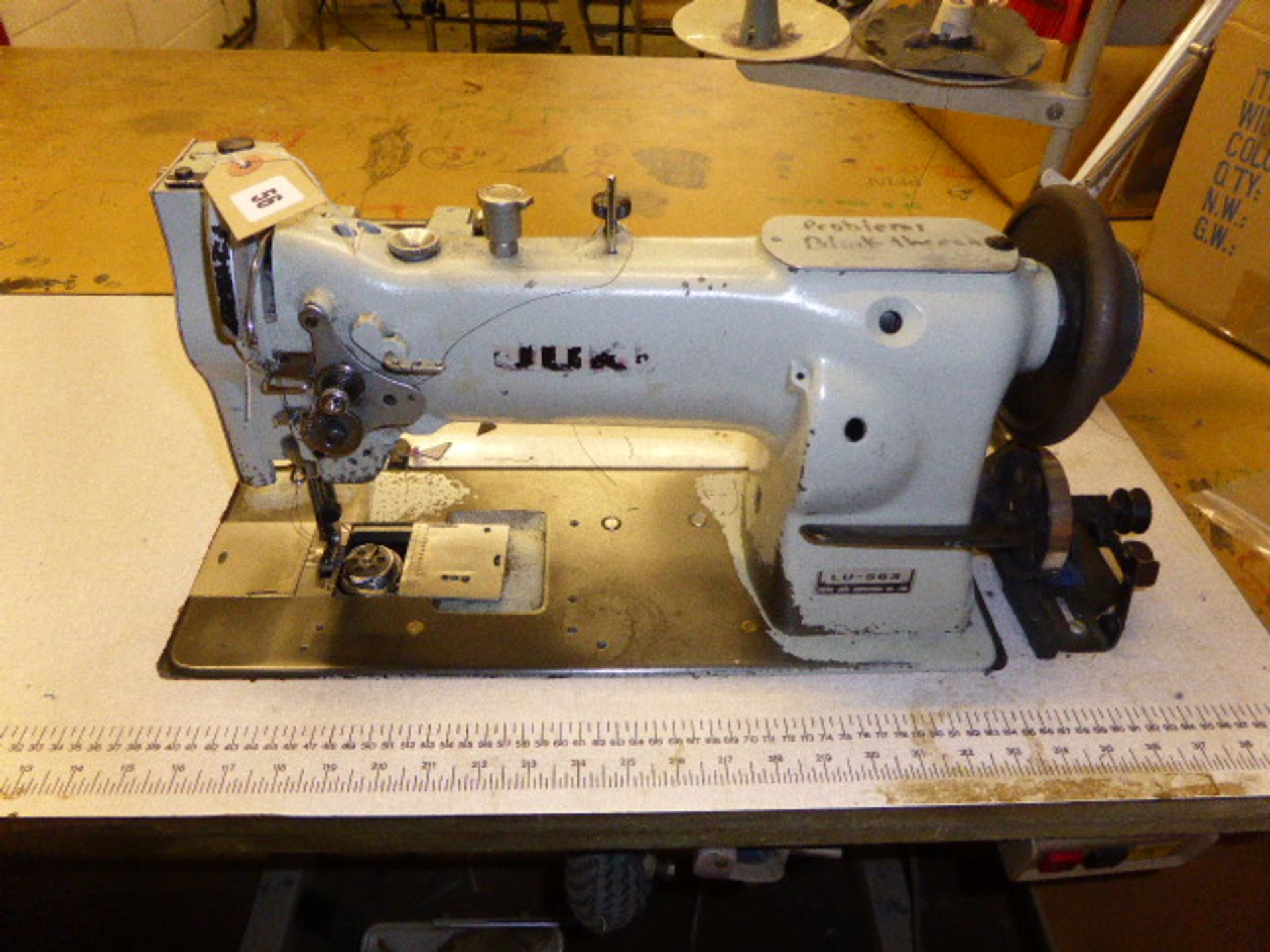 Juki model LU-563 flatbed single needle industrial sewing machine, single phase