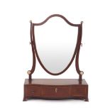 A 19th century mahogany and strung serpentine fronted mirror,