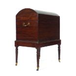 An early 19th century mahogany cellarette,