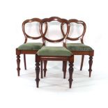 A set of eight Victorian mahogany balloon back dining chairs on turned legs CONDITION