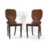 A pair of Victorian pollarded oak hal chairs,