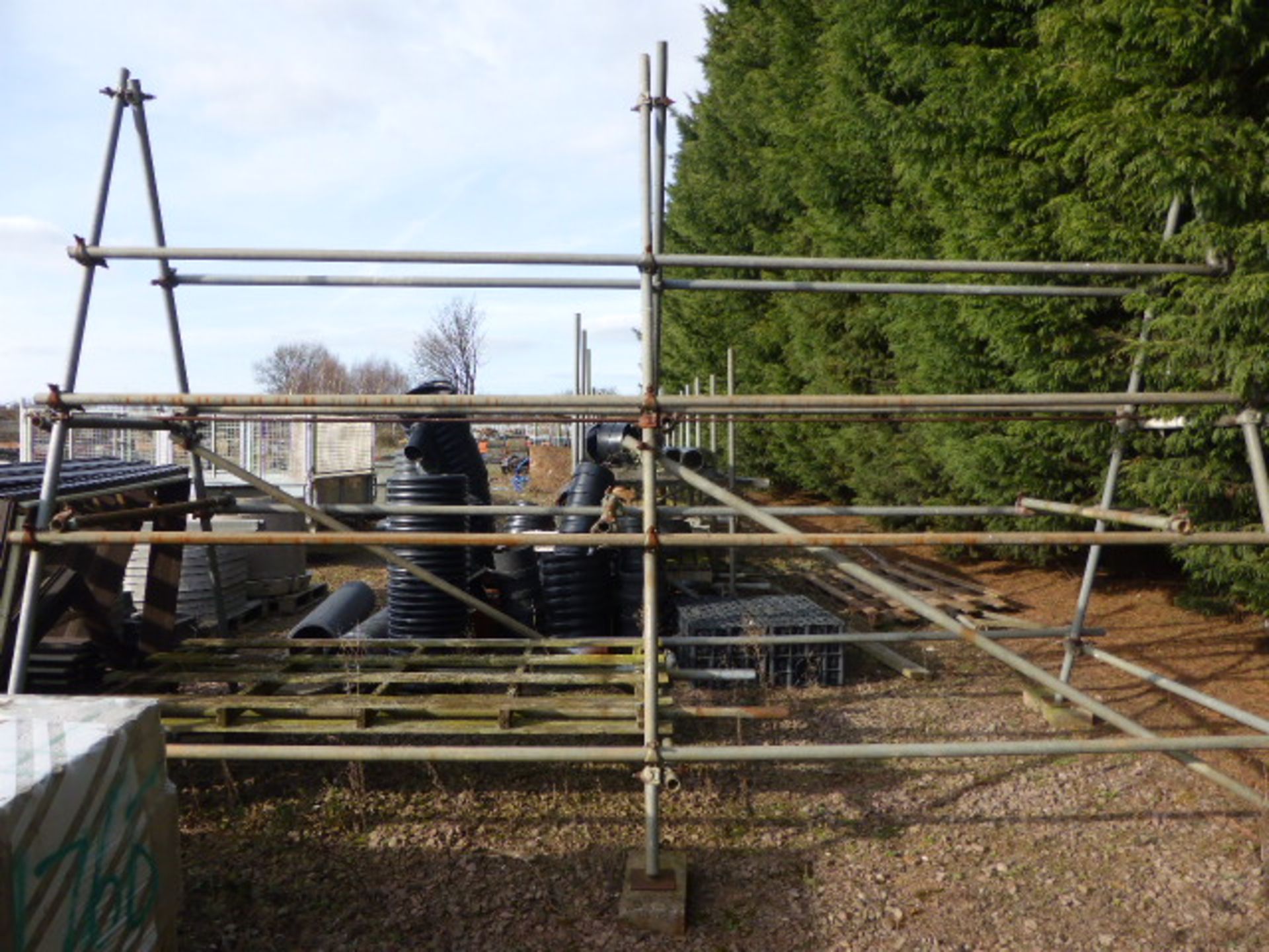 A range of galvanized scaffold tube and fittings, currently erected as racking for pipe fittings etc - Image 6 of 7