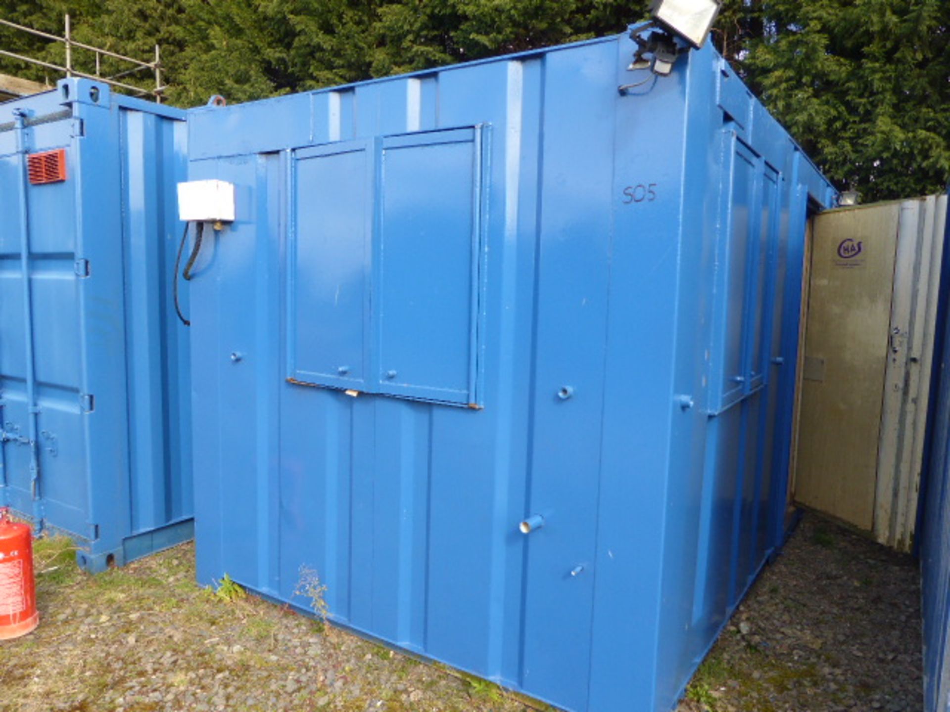 Corrugated steel clad office container building with security shutters and single door, exterior - Image 8 of 9