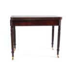 A George IV mahogany, crossbanded and brass inlaid tea table on turned barley twist legs,