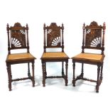 A set of six 17th century-type oak dining chairs,