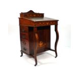 An Edwardian Sheraton Revival rosewood and inlaid davenport,