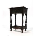 A 17th century-type oak stool,