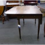 A late 19th century mahogany pembroke table on slender turned legs, extends to 91.5 x 103.