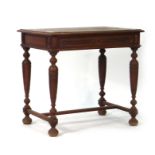 An 18th century oak and crossbanded side table with a single frieze drawer on turned legs joined by