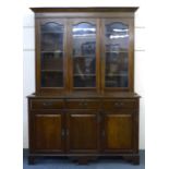 A 20th century mahogany display cabinet,