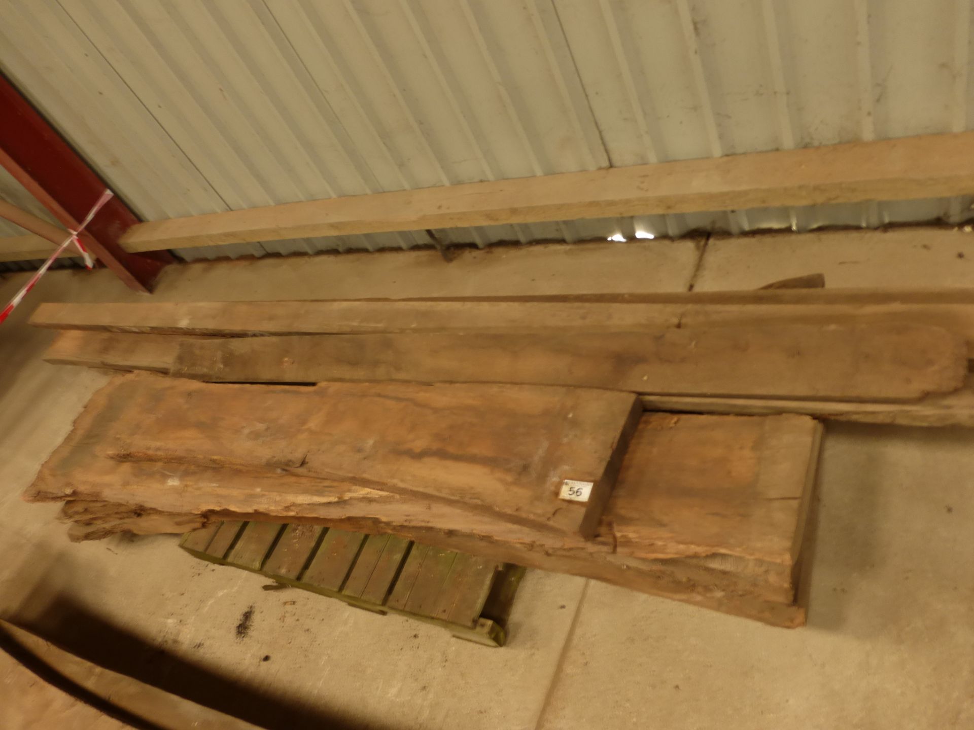 A pallet of 11 miscellaneous waney edge and rough sawn oak boards in various sizes, up to