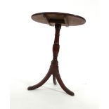 A late 18th/early 19th century oak wine table,