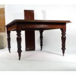 A Victorian mahogany extending dining table, with one fitted leaf, on turned legs with castors, max.