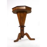 A Victorian walnut sewing table,