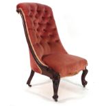 A 19th century rosewood and button upholstered chair on scrolled feet CONDITION REPORT: